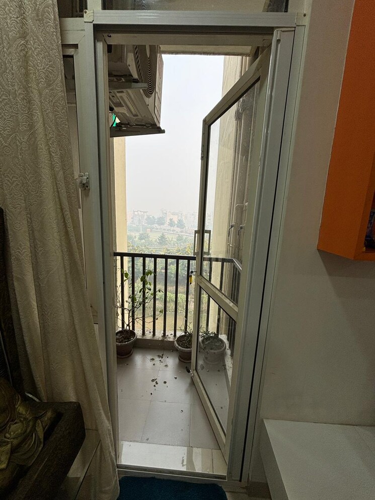 Balcony, wave-executive-floors 2 Bedroom 900 Sq.Ft. Apartment In Wave City Ghaziabad 8899557