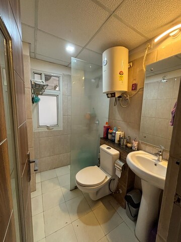 Bathroom in 2 BHK Apartment at Wave Executive Floors, Wave City – for Rent