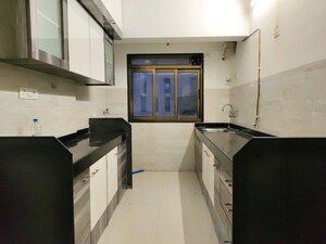 Kitchen in 2 BHK Apartment at Raj Infinia, Malad West – for Sale