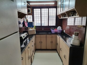 Kitchen in 2 BHK Apartment at Sunita Apartment, Peddar Road – for Rent