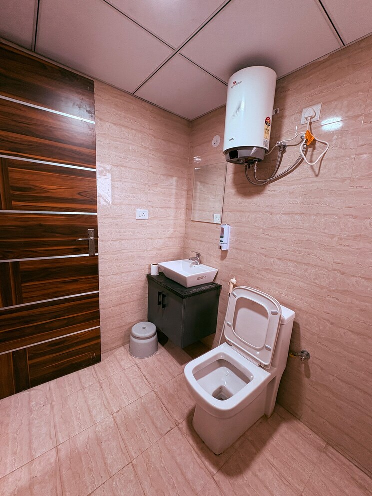 Bathroom, okay-plus-solitaire-suites Studio 403 Sq.Ft. Apartment In Ramnagariya Jaipur 8899739