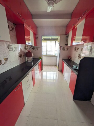 Kitchen in 3 BHK Apartment at Parshwa Girnar Tirth, Kalyan West – for Rent