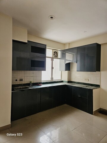 Kitchen in 2 BHK Apartment at Breez Global Heights, Sohna Sector 33 – for Rent