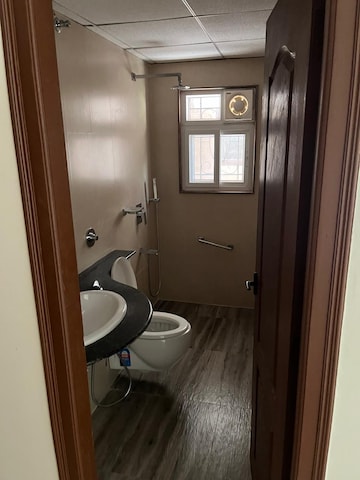 Bathroom in 3 BHK Apartment at Rishita Manhattan, Gomti Nagar – for Rent