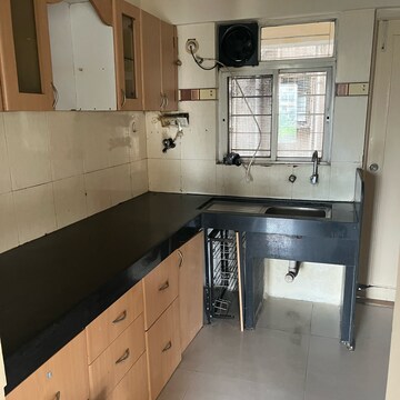 Kitchen in 2 BHK Apartment at Goel Ganga Hari Ganga, Yerawada – for Rent