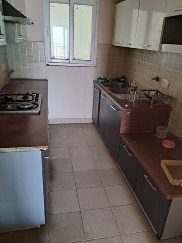 Kitchen in 2 BHK Apartment at Mahagun Moderne, Sector 78 – for Rent