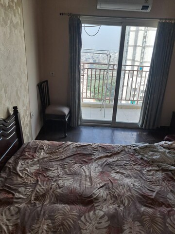 Bedroom in 2 BHK Apartment at Mahagun Moderne, Sector 78 – for Rent
