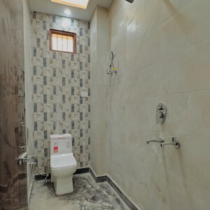 Bathroom in 3 BHK Independent House at RWA Mohan Garden Block R3 Gali 3, Razapur Khurd – for Sale