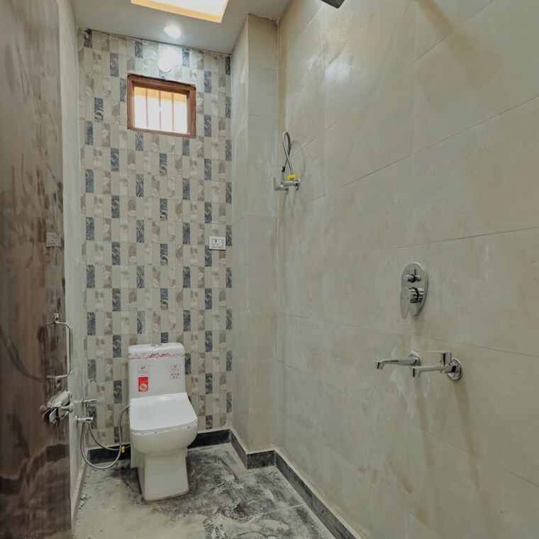 Bathroom, rwa-mohan-garden-block-r3-gali-3 3 Bedroom 50 Sq.Yd. Independent House In Razapur Khurd Delhi 8900286
