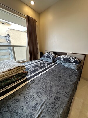 Bedroom in 2 BHK Apartment at Lokhandwala – for Sale