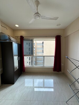 Room in 2 BHK Apartment at Lokhandwala – for Sale