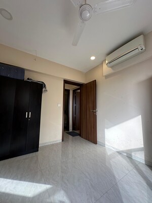 Room in 2 BHK Apartment at Lokhandwala – for Sale