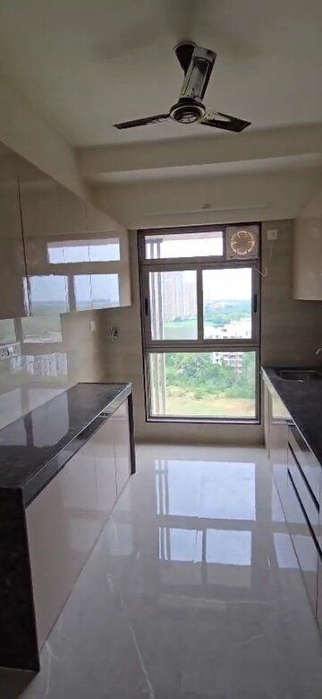Kitchen in 2 BHK Builder Floor at Veena Smart Homes, Kandivali West – for Sale