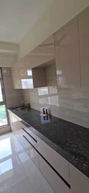 Kitchen in 2 BHK Builder Floor at Veena Smart Homes, Kandivali West – for Sale