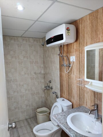 Bathroom in 3 BHK Apartment at Mahagun Mantra I, Sector 10 Greater Noida – for Rent