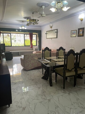 Living Room in 4 BHK Apartment at Jewel Palace, Khar West – for Sale