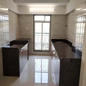 Kitchen in 3 BHK Apartment at Kanungo Pinnacolo Apartment, Mira Road – for Sale
