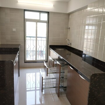 Kitchen in 3 BHK Apartment at Kanungo Pinnacolo Apartment, Mira Road – for Sale
