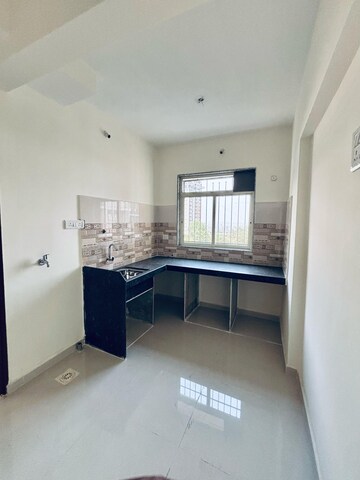 Kitchen in 1 BHK Apartment at Panvelkar Utsav Phase 1, Badlapur West – for Sale