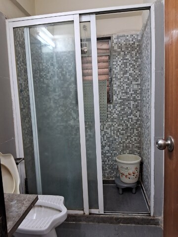 Bathroom in 2 BHK Apartment at Dosti Flamingos, Parel – for Rent