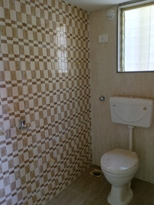 Bathroom in 1 BHK Apartment at Badlapur East – for Sale