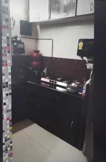 Kitchen in 2 BHK Apartment at Rail Vihar CHS, Kharghar Sector 4 – for Rent