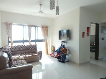 Living Room in 2 BHK Apartment at Rustomjee Meridian, Kandivali West – for Sale