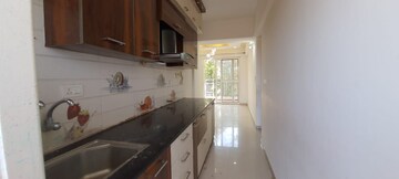 Kitchen in 2 BHK Apartment at Green Earth Atrium, Whitefield – for Rent