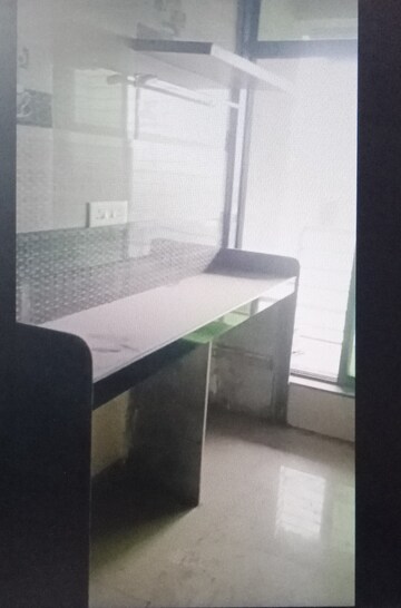 Kitchen in 2 BHK Apartment at Suncity Avenue, Kharghar – for Sale