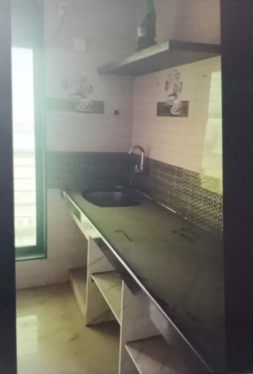Kitchen in 2 BHK Apartment at Suncity Avenue, Kharghar – for Sale
