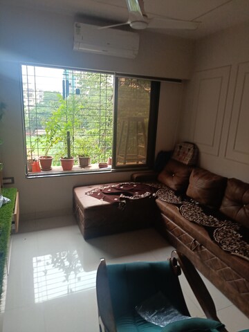 Living Room in 2 BHK Apartment at Shree Abhishek CHS, Kandivali West – for Sale