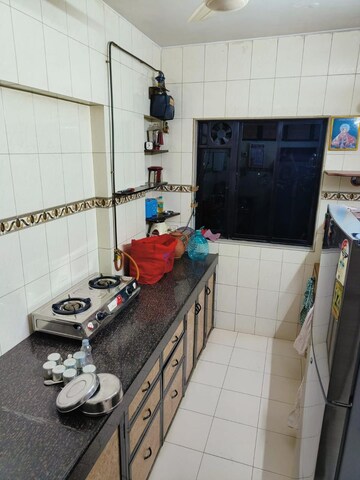 Kitchen in 2 BHK Apartment at Sudarshan CHS Parel, Parel – for Rent