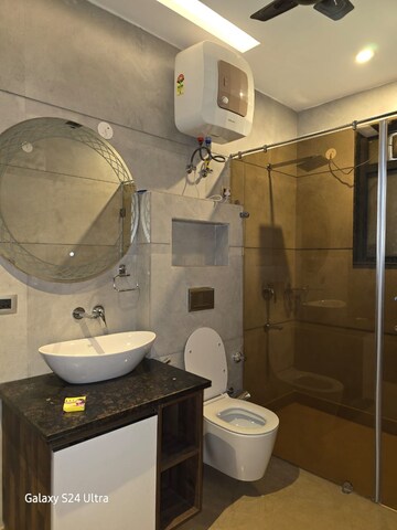 Bathroom in 4 BHK Builder Floor at Palam Vihar Residents Association, Palam Vihar – for Rent