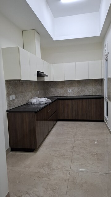 Kitchen in 4 BHK Apartment at Uchdpl Veridia Oakwood Enclave, Wave City – for Rent
