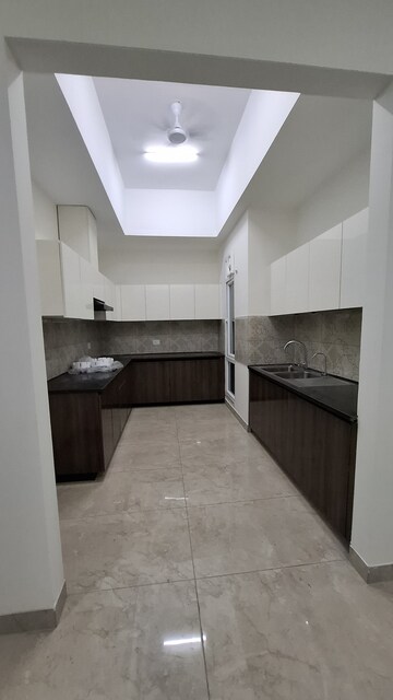Kitchen in 4 BHK Apartment at Uchdpl Veridia Oakwood Enclave, Wave City – for Rent