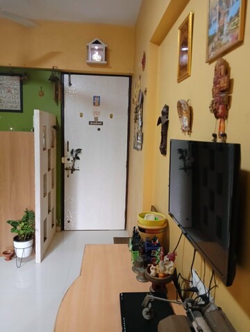 Living Room in 1 BHK Apartment at Bhoomi Acres, Waghbil – for Sale