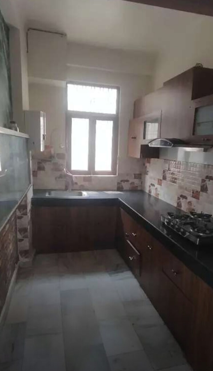 Kitchen, the mall avenue 3 Bedroom 1630 Sq.Ft. Apartment In The Mall Avenue Lucknow 8901687