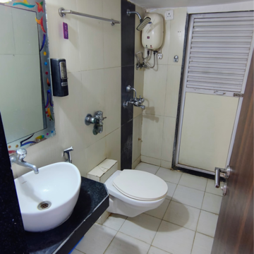 Bathroom in 1 BHK Apartment at Ekta Brooklyn Park, Y K Nagar – for Rent