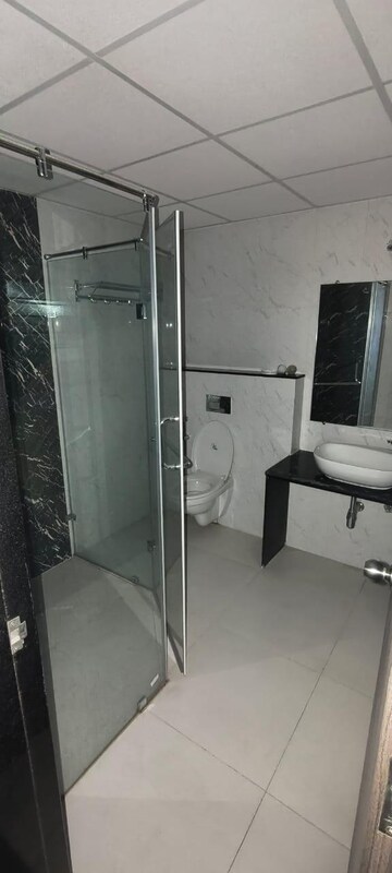 Bathroom in 3 BHK Apartment at Kolte Patil Centria, Undri – for Rent