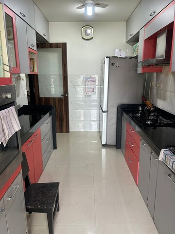Kitchen in 3 BHK Apartment at Rustomjee OZone, Goregaon West – for Rent