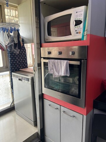 Kitchen in 3 BHK Apartment at Rustomjee OZone, Goregaon West – for Rent