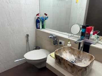Bathroom in 3 BHK Apartment at Rustomjee OZone, Goregaon West – for Rent