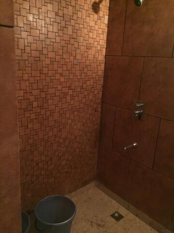 Bathroom in 3 BHK Apartment at Panchsheel Enclave – for Rent