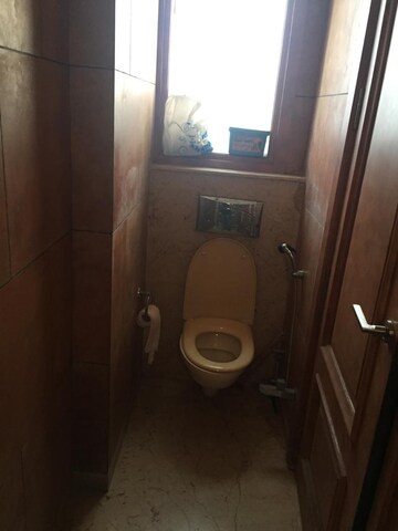 Bathroom in 3 BHK Apartment at Panchsheel Enclave – for Rent