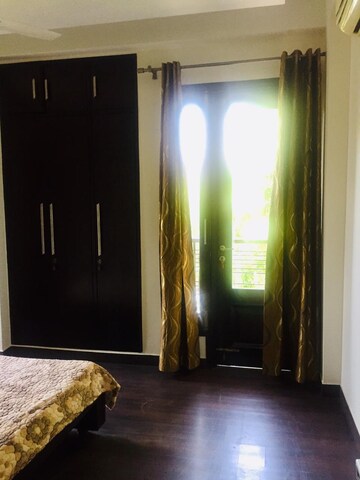 Bedroom in 3 BHK Apartment at Panchsheel Enclave – for Rent