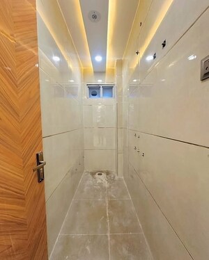 Bathroom in 3 BHK Apartment at Mahavir Enclave 1 – for Sale