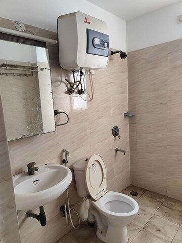 Bathroom in 3 BHK Apartment at Great Value Sharanam, Sector 107 – for Rent