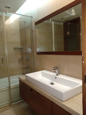 Bathroom in 3 BHK Apartment at Defence Colony – for Rent