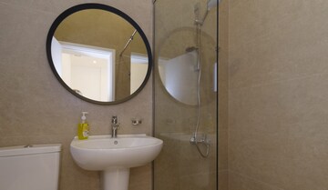 Bathroom in 3 BHK Apartment at Lotus Unity, Versova – for Rent
