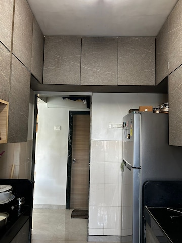 Kitchen in 1 BHK Apartment at Atul Blue Empire, Kandivali West – for Sale